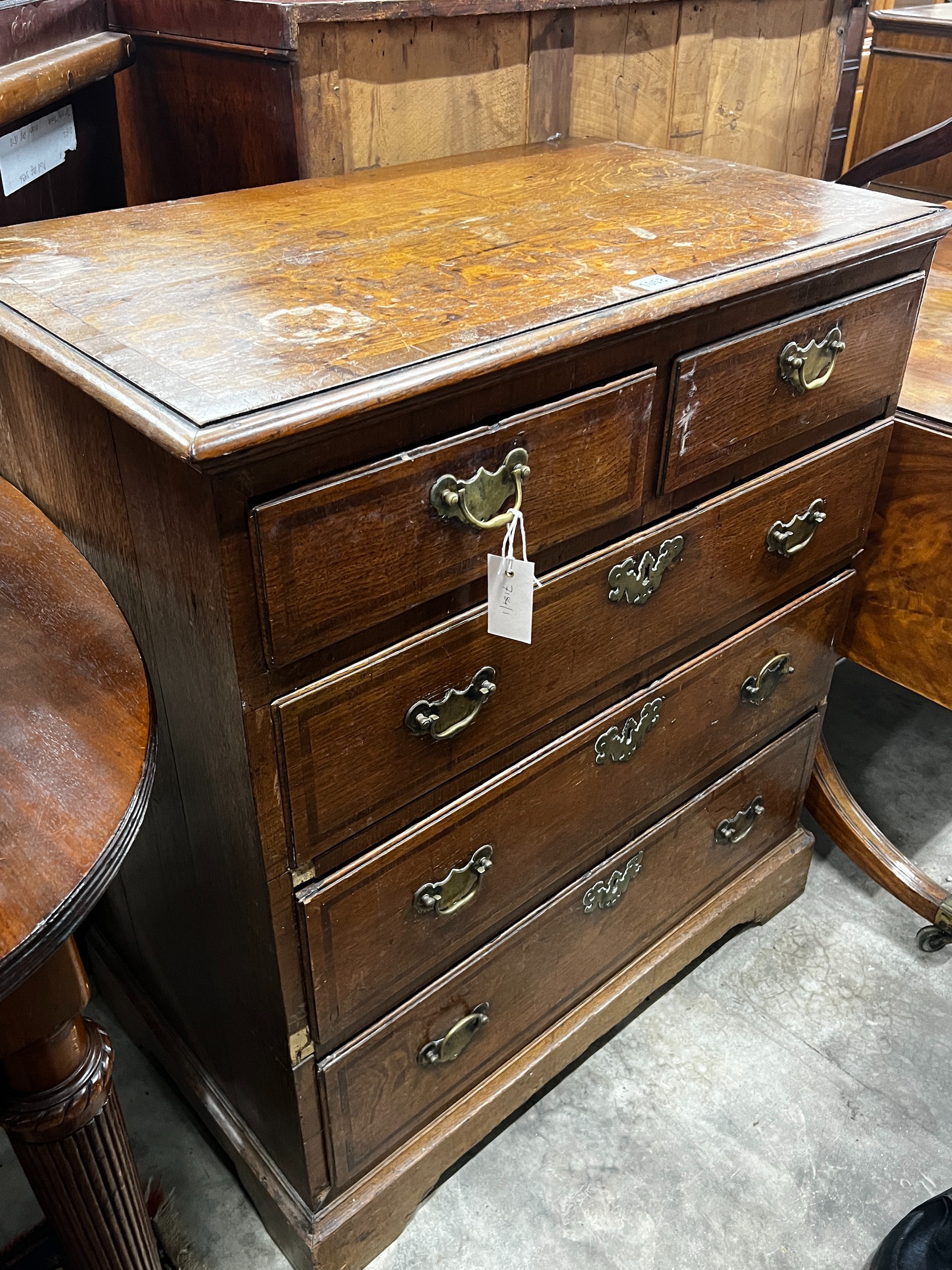 A George III mahogany banded oak chest of drawers, width 81cm, depth 49cm, height 92cm